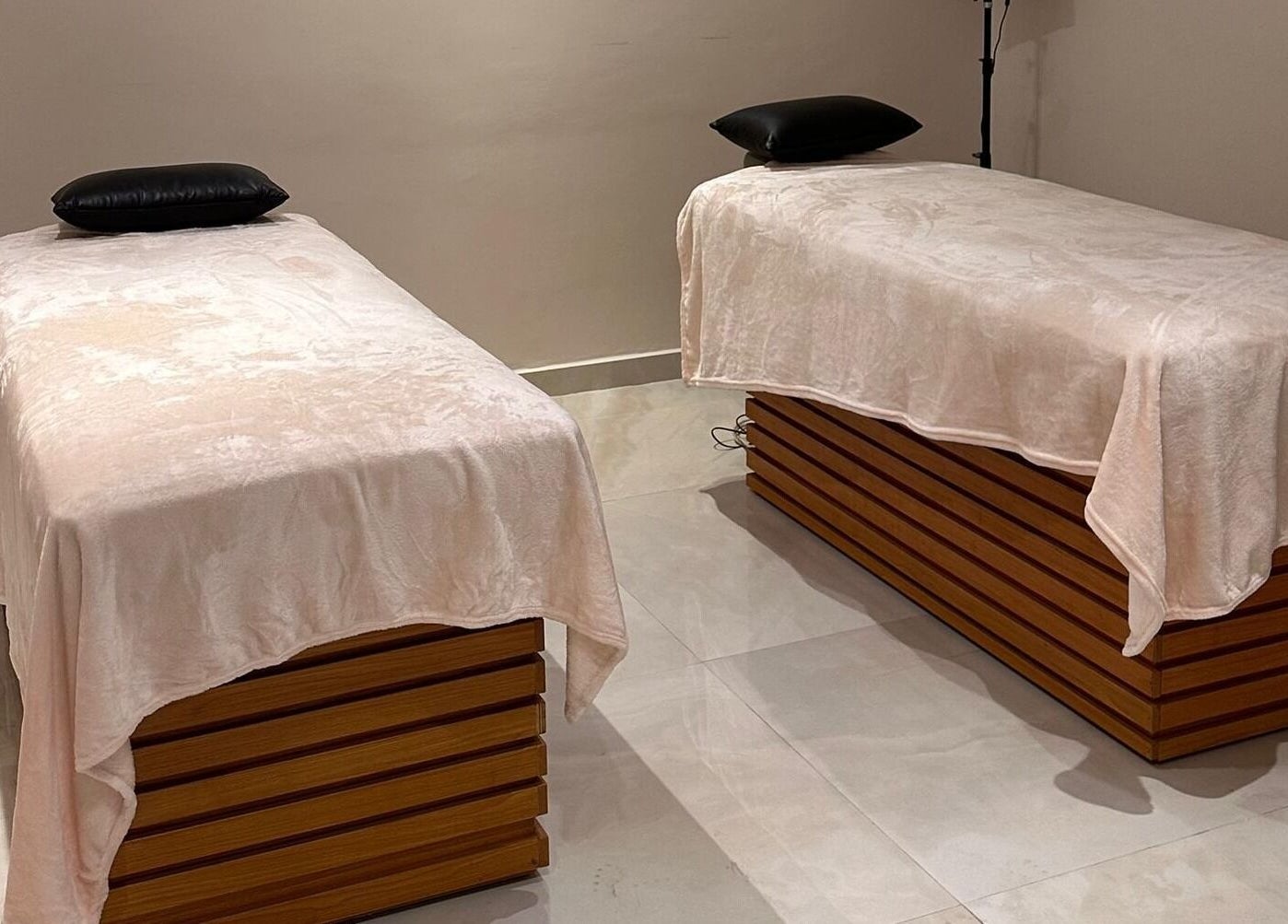 Indigoluxe spa massage tables in serene setting, Lagos, Lagos, NG.