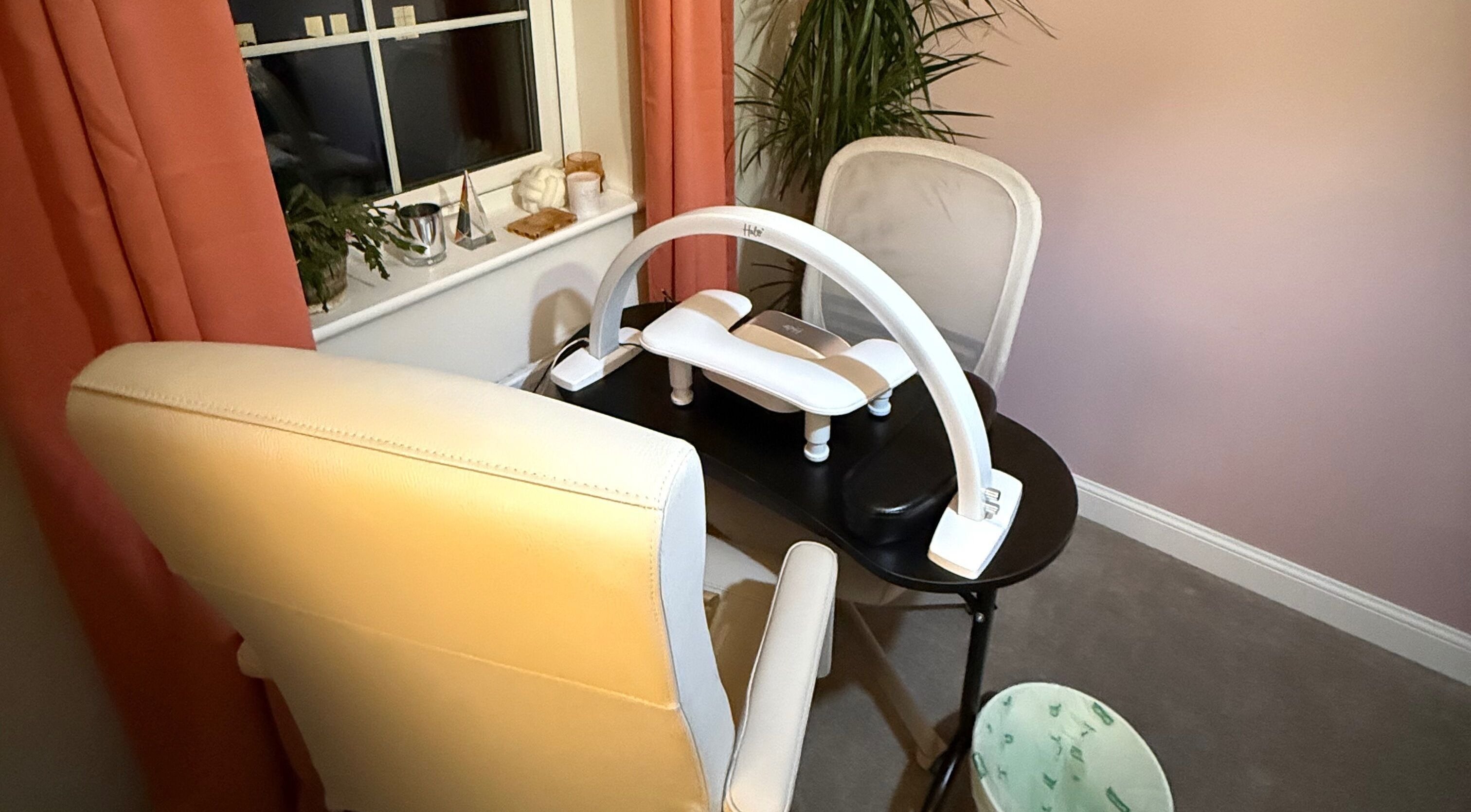 Manicure station at Essence Beauty, cozy ambiance in Barnsley, England, GB with elegant decor.