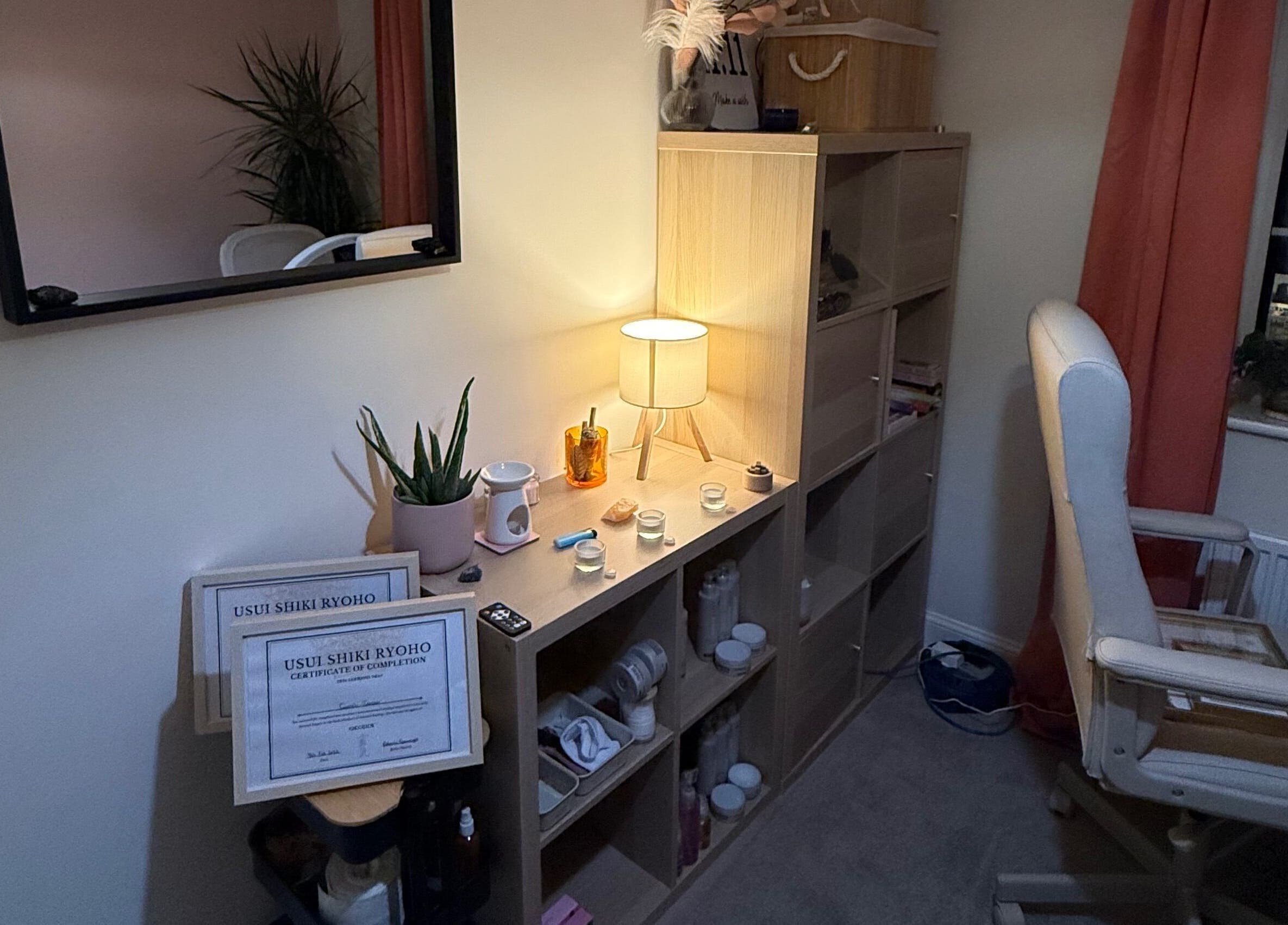 Essence Beauty's serene treatment room in Barnsley, England, GB with elegant decor and comfortable chair.
