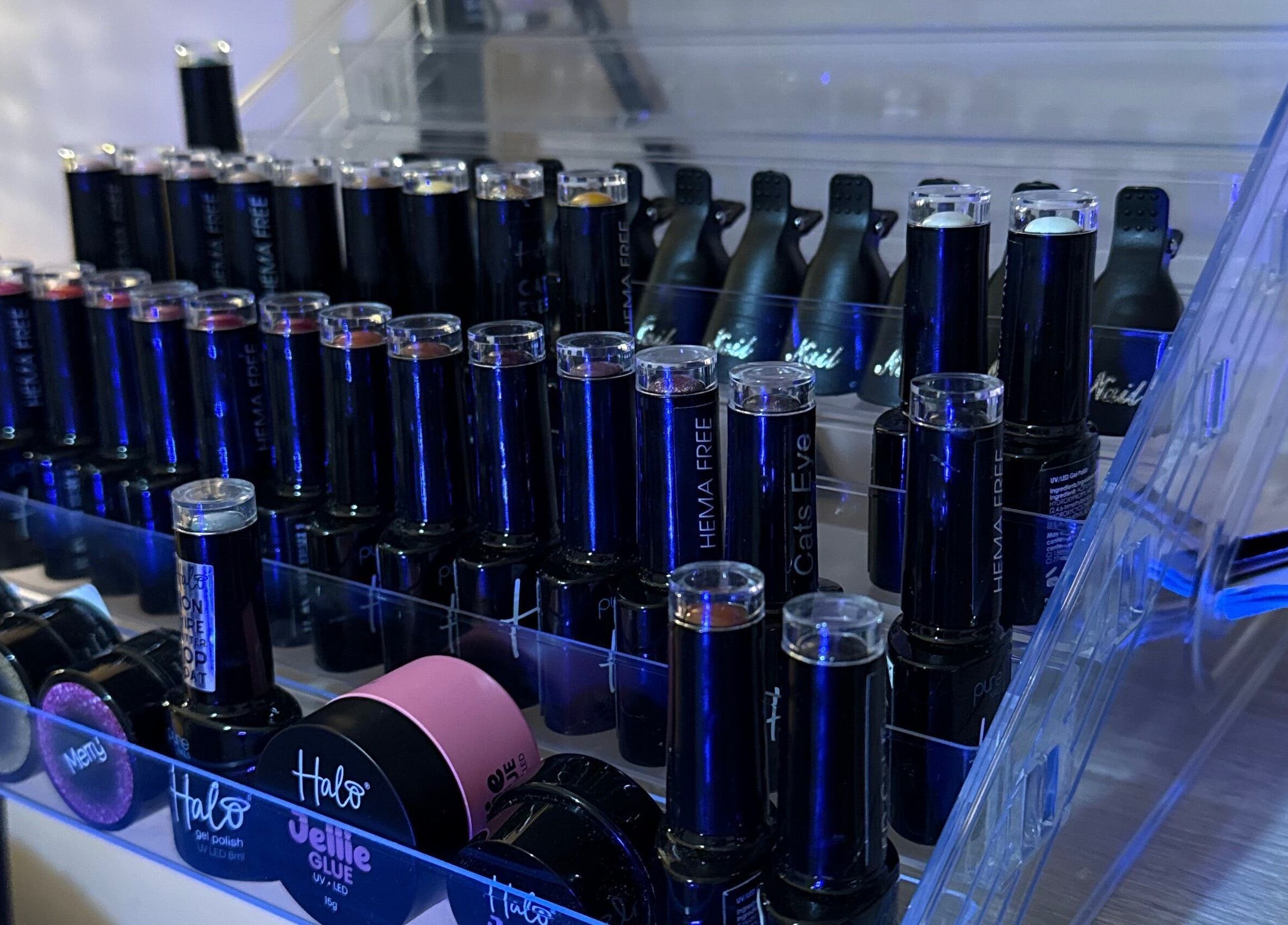 Display of nail polishes at Essence Beauty, Barnsley, England, GB showcasing variety of vibrant shades.