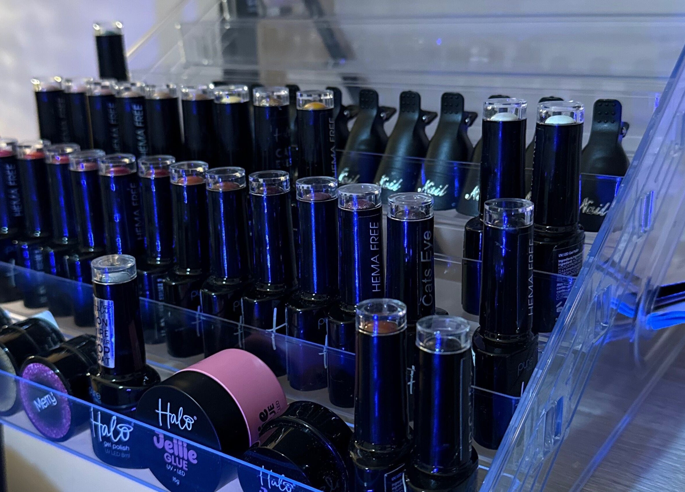 Display of nail polishes at Essence Beauty, Barnsley, England, GB showcasing variety of vibrant shades.