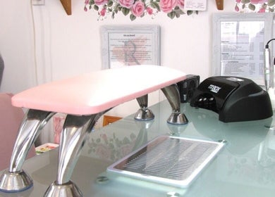 Rambling Rose Nails' chic station in Mangawhai, Northland, NZ, showcasing modern tools and a serene setting.
