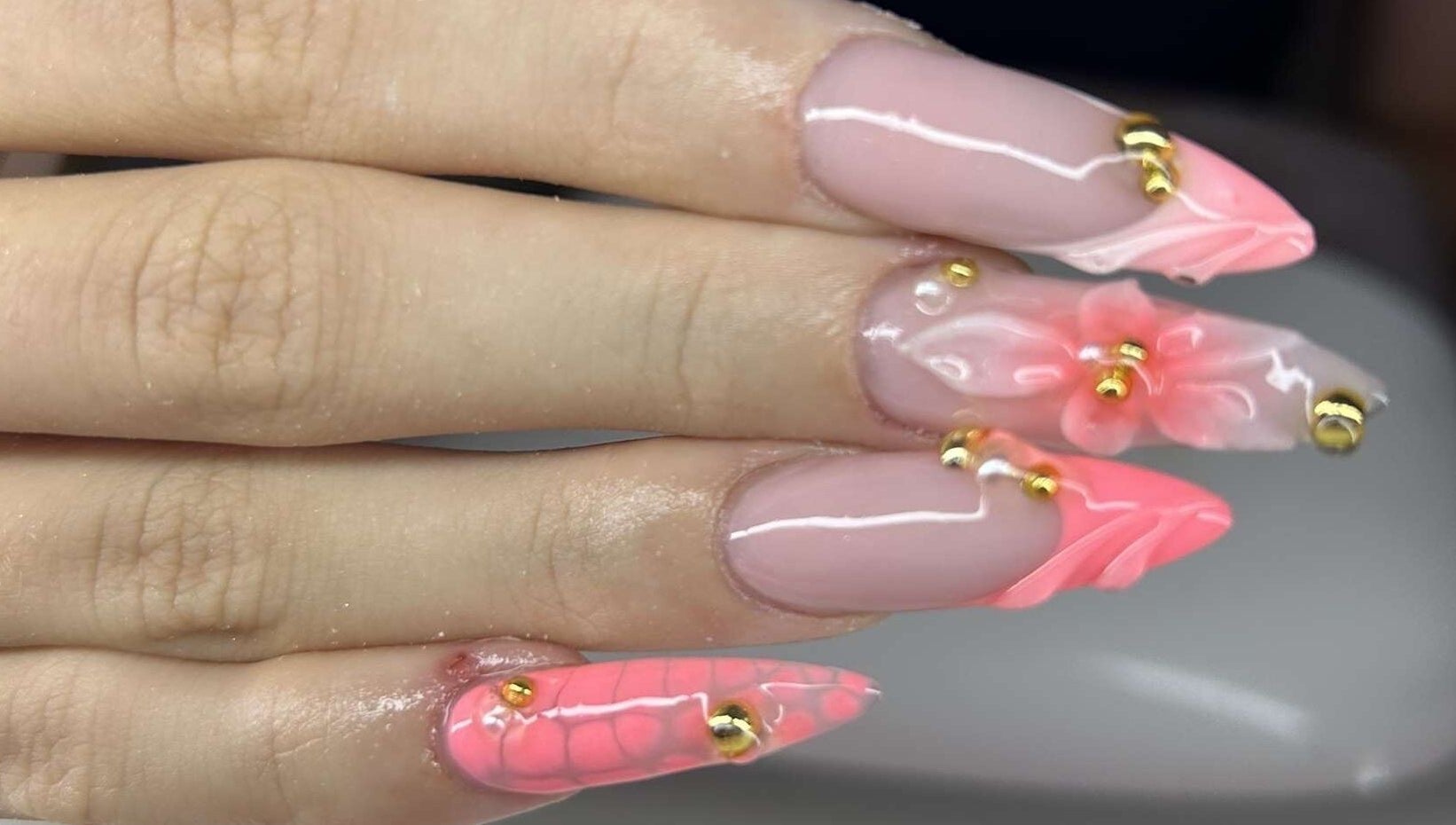 Stylish pink floral acrylic nails at Nails.byavagray in Dunfermline, Scotland, GB.
