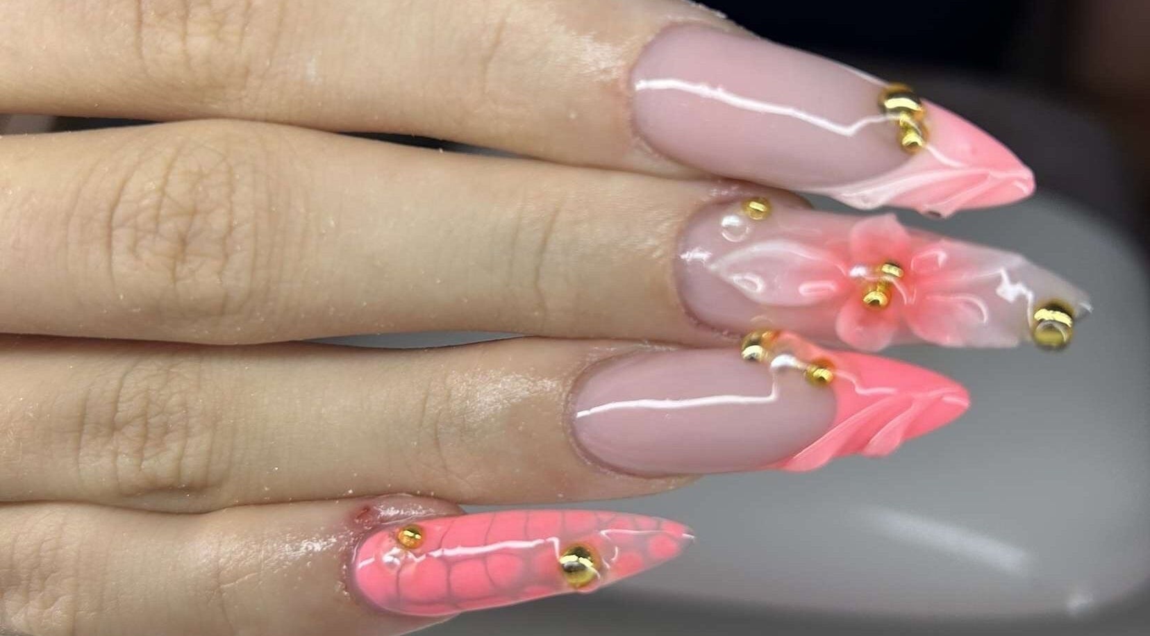Stylish pink floral acrylic nails at Nails.byavagray in Dunfermline, Scotland, GB.