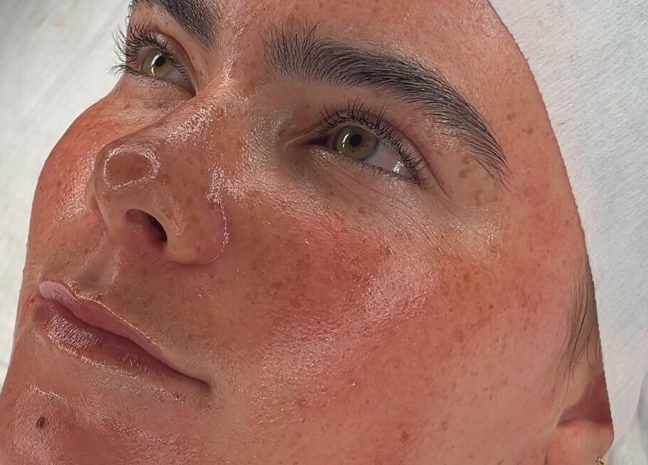 Close-up of a relaxed face with glowing skin at Skin Diary By Toyah, London, England, GB.