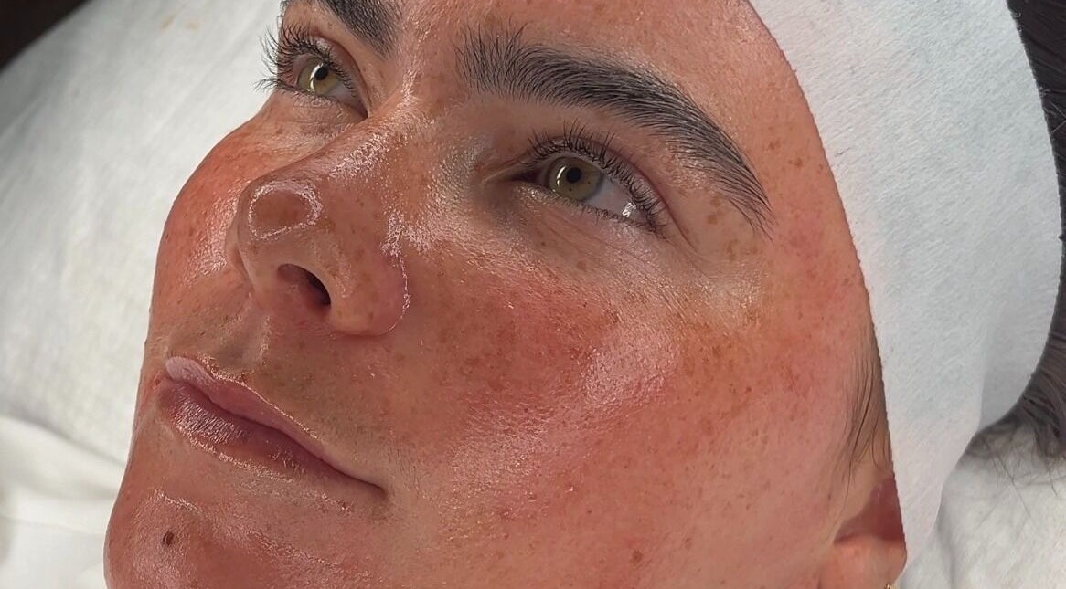 Close-up of a relaxed face with glowing skin at Skin Diary By Toyah, London, England, GB.