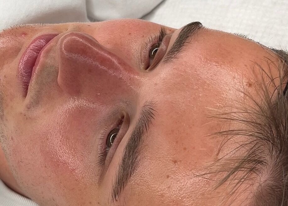 Relaxed individual receiving a facial treatment at Skin Diary By Toyah, London, England, GB.