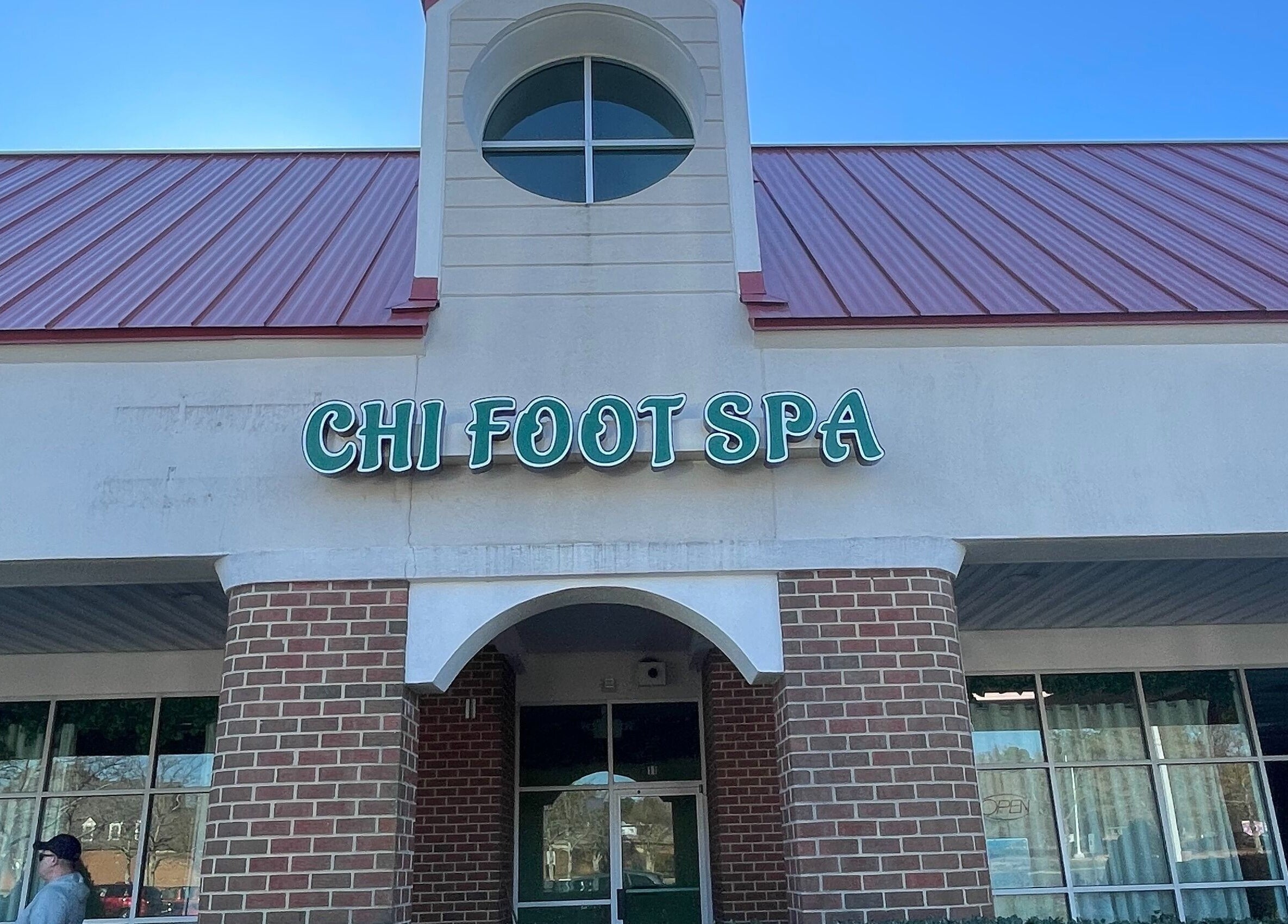 Front entrance of Chi Foot Spa, Williamsburg, Virginia, US, featuring bold signage.