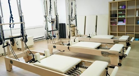 Li Pilates studio with reformer machines in Burnaby, British Columbia, CA offers wellness and fitness classes.