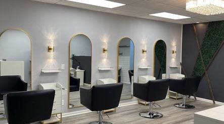 Chic styling station at M Salon Beauty, showcasing sleek chairs and mirrors in Scottsdale, Arizona, US.