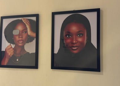 Framed portraits at NinnieStudioCo showcasing stylish designs in Lagos, Lagos, NG.