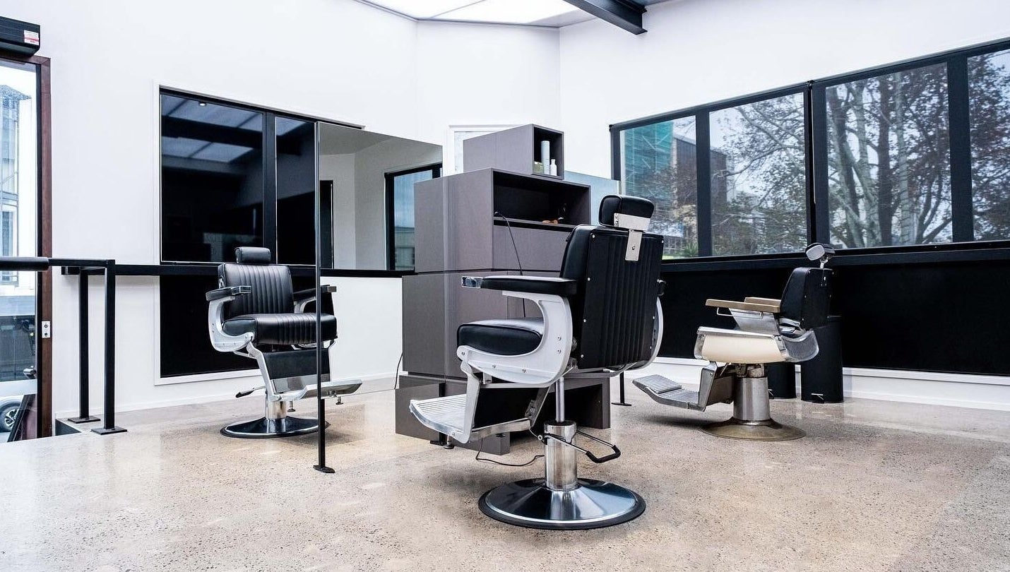 Modern salon chairs at Urban Goose in Auckland, NZ, showcasing sleek interior design and elegance.