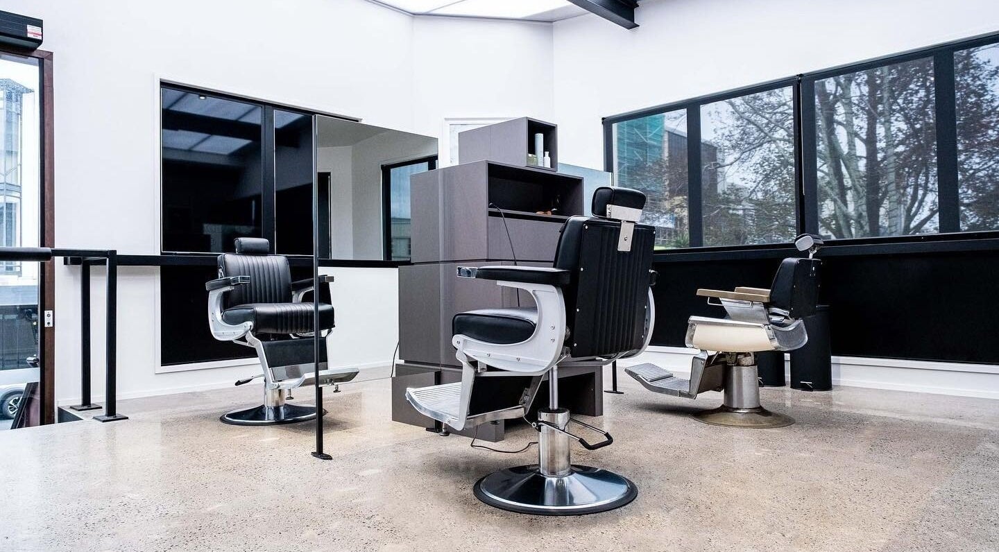 Modern salon chairs at Urban Goose in Auckland, NZ, showcasing sleek interior design and elegance.