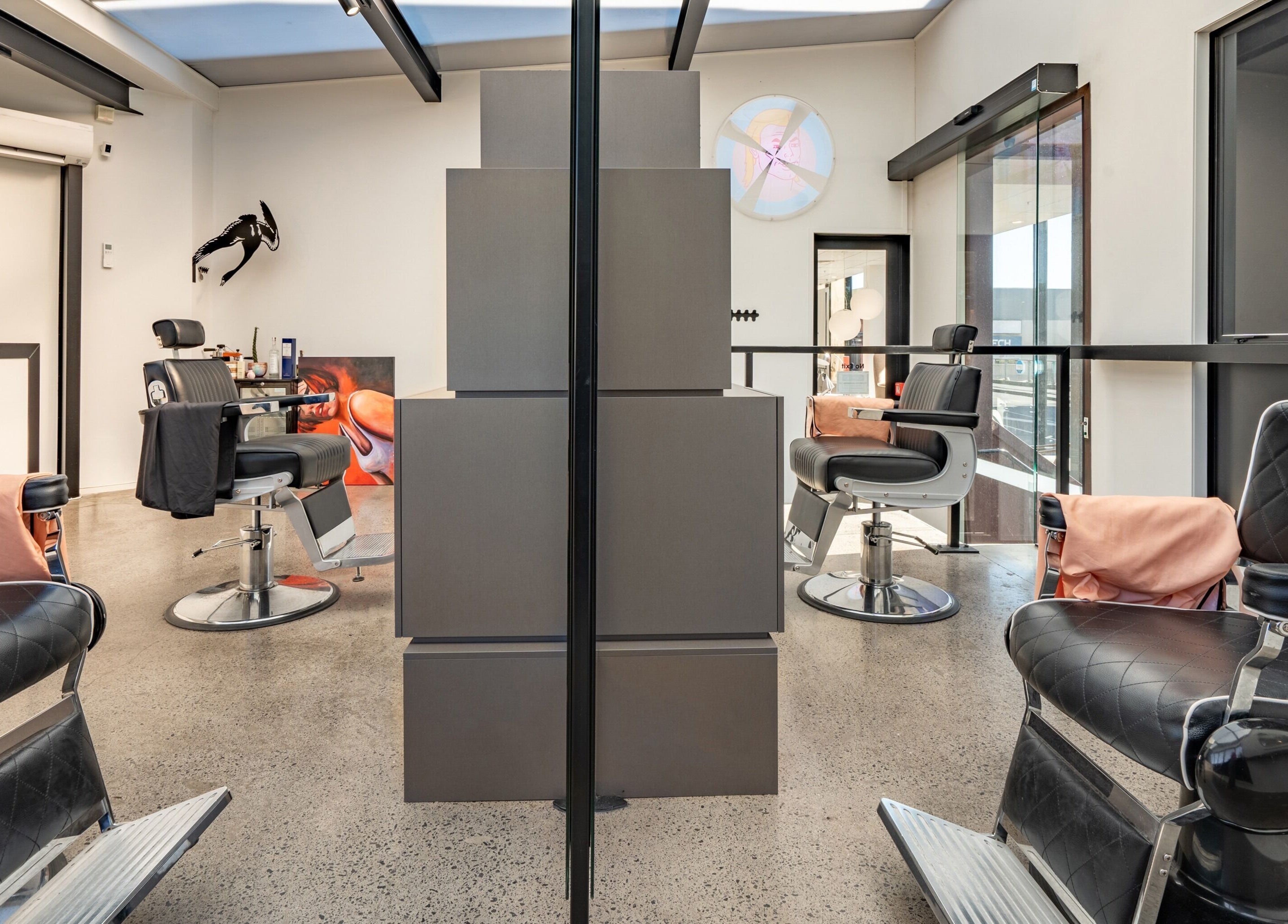 Modern barber chairs in Urban Goose at Auckland, Auckland, NZ, featuring sleek interior design.