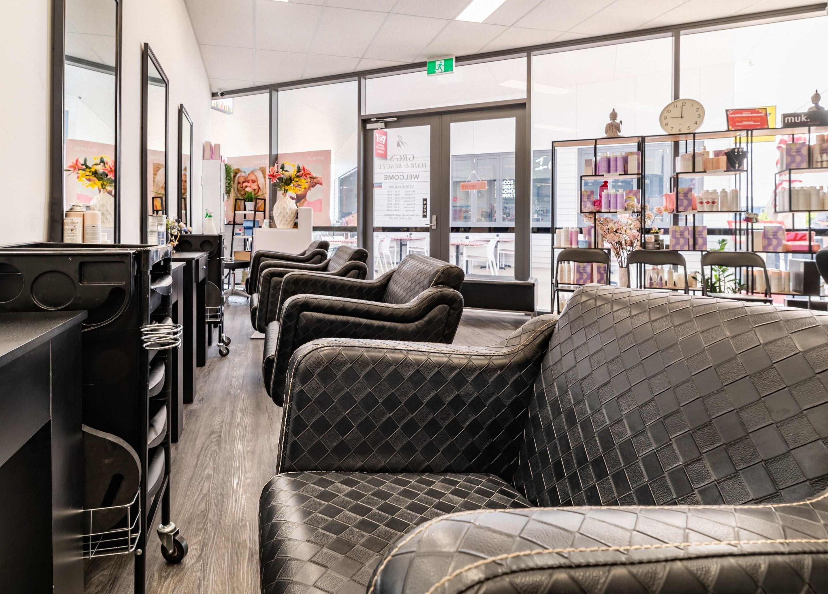 Luxurious interior of GRG’s Hair & Beauty in Spring Mountain, Queensland, AU featuring plush seating and décor.