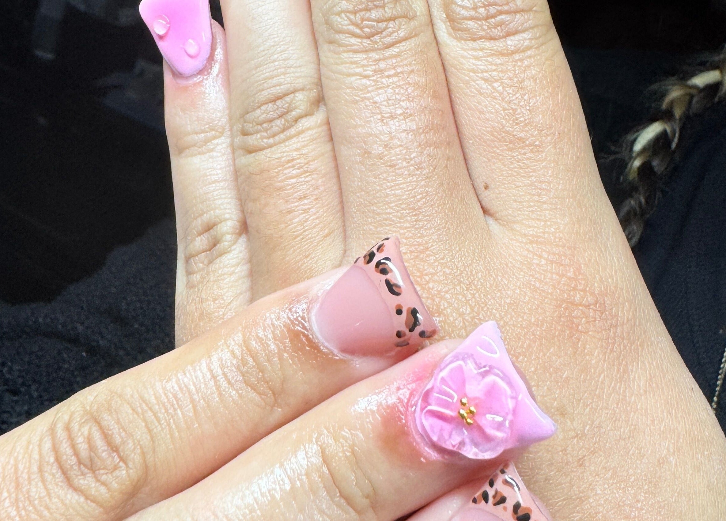 Stylish pink and floral nail art at Bullet Beauty Bar, Meadow Springs, Western Australia, AU.