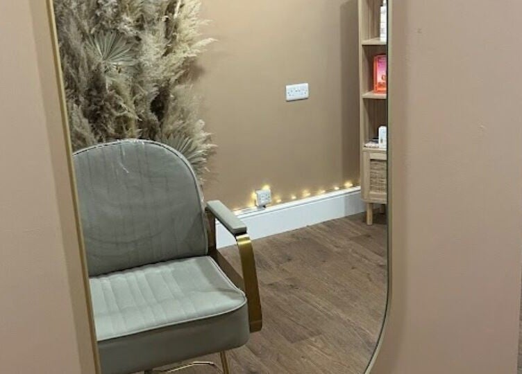 Elegant salon chair and mirror at Goddess Rising Hair Extensions, Belper, England, GB.
