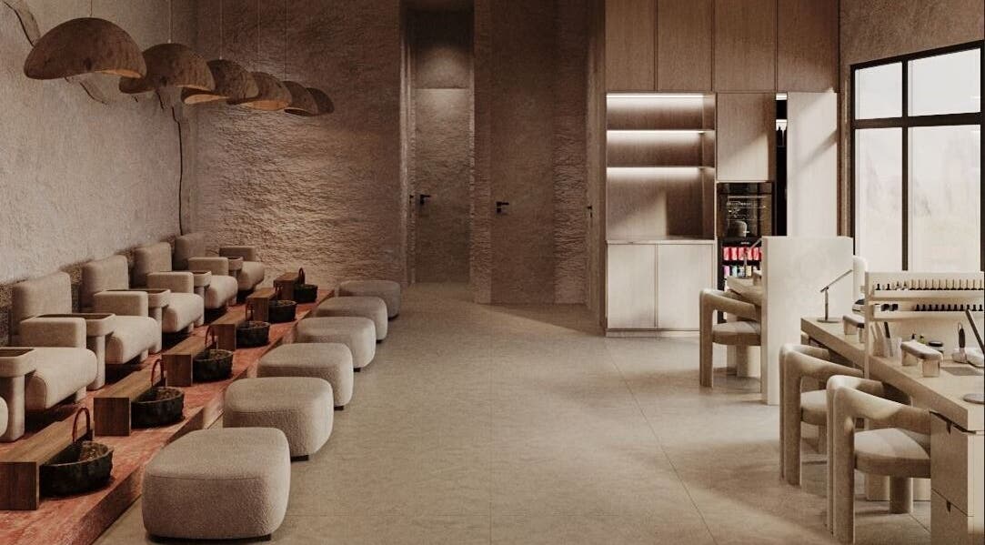 Elegant interior of Coated Beauty Lounge in Ras Al-khaimah, featuring plush seating and modern decor.