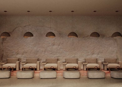 Chic seating area at Coated Beauty Lounge, Ras Al-khaimah, Ras Al Khaimah, AE, with modern decor.