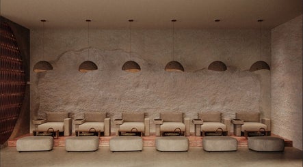 Chic seating area at Coated Beauty Lounge, Ras Al-khaimah, Ras Al Khaimah, AE, with modern decor.