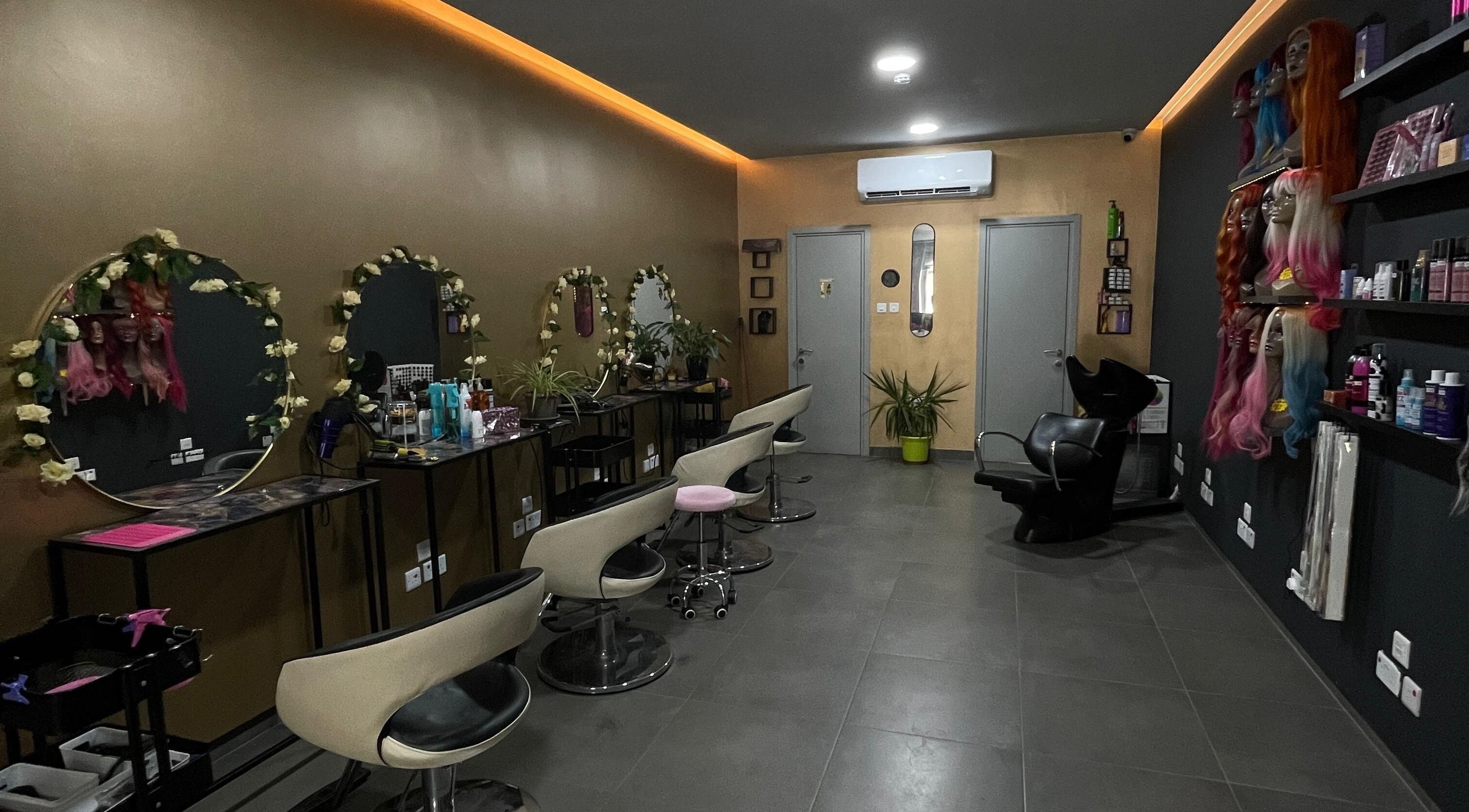 Stylish salon interior at Hair Extensions by Yasmin Fgura, Il-fgura, MT, showcasing modern chairs and decor.