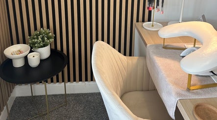 Elegant nail station setup at Muse Beauty Studio, Port Talbot, Wales, GB with inviting decor and warm lighting.