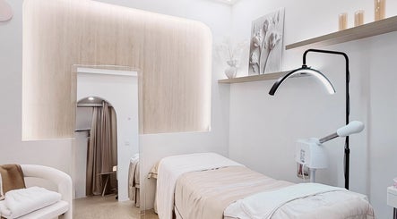 Tranquil treatment room at The Skin Edit, Singapore, SG showcasing elegant decor and soothing ambiance.
