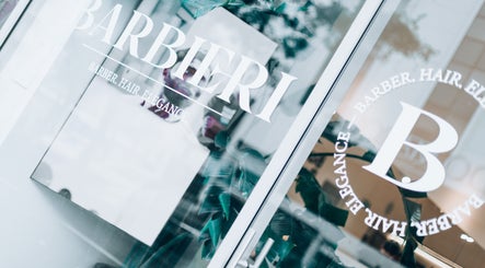 Entrance of Barbieri Barbershop & SPA (Gerês) in Lisboa, Lisboa, PT showcasing stylish decor.