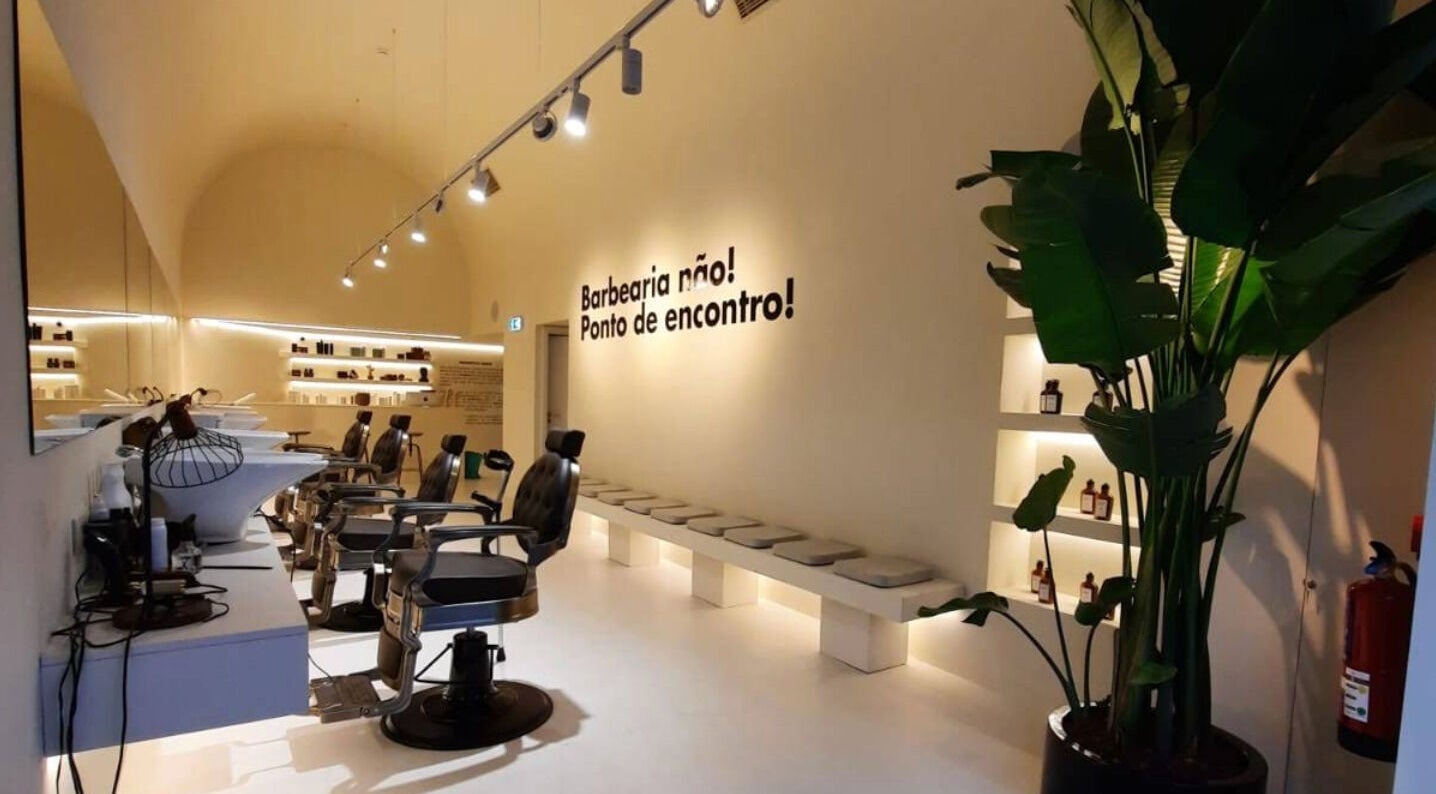 Modern interior of Barbieri Barbershop & SPA (Gerês) in Lisboa, Lisboa, PT, featuring sleek chairs and decor.