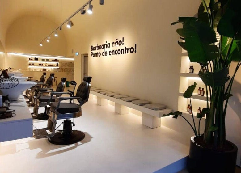 Elegant interior of Barbieri Barbershop & SPA in Lisboa, Lisboa, PT, showcasing sleek chairs and stylish decor.