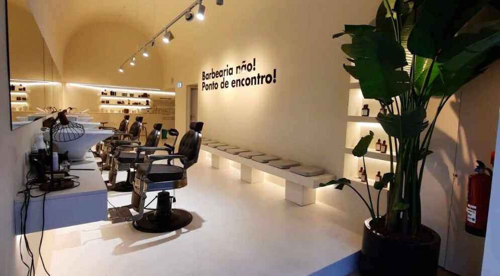Elegant interior of Barbieri Barbershop & SPA in Lisboa, Lisboa, PT, showcasing sleek chairs and stylish decor.