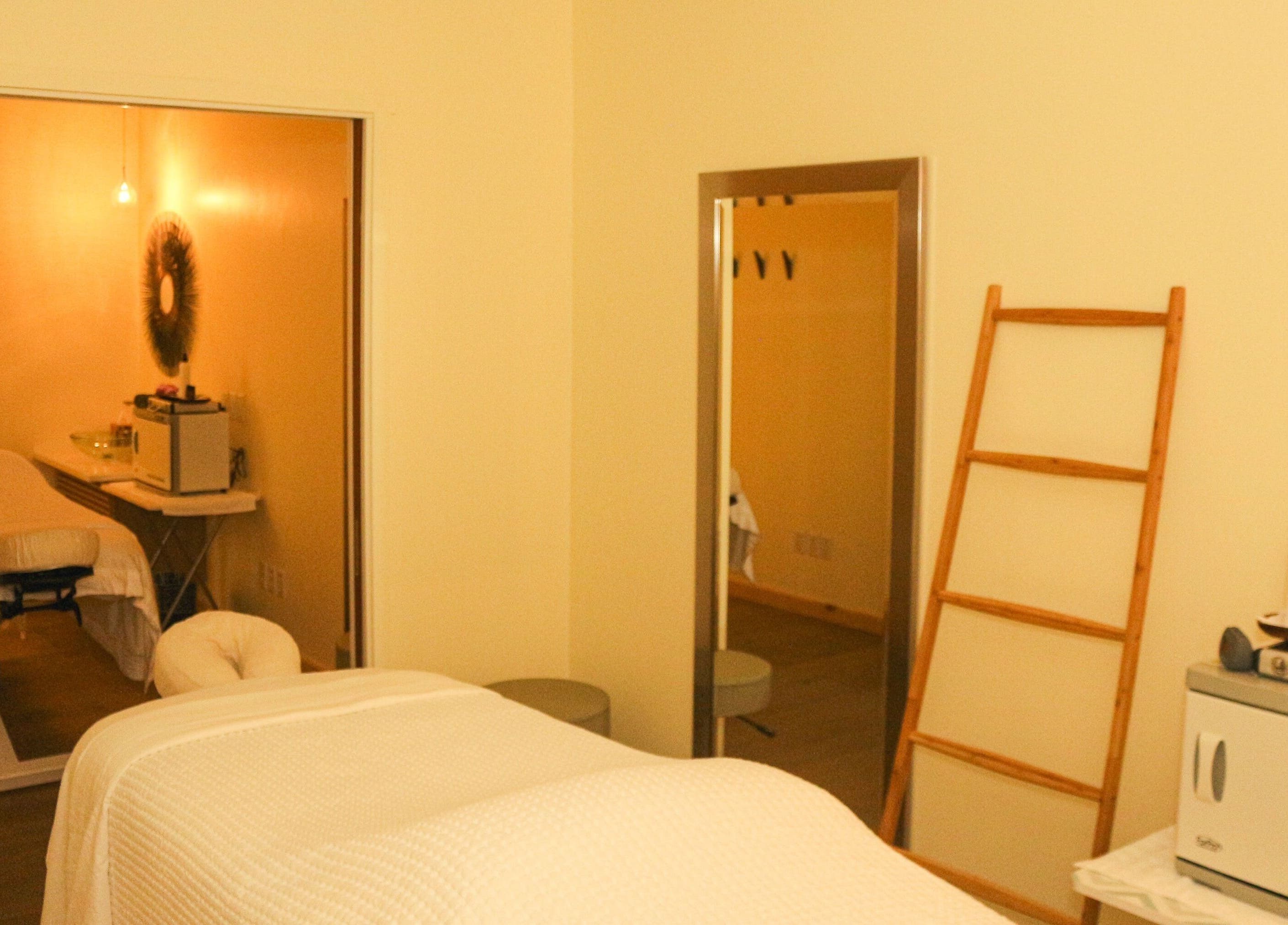 Relaxing massage room at The Lotus Center Spa, Virgin Gorda, British Virgin Islands, US, with comforting decor.