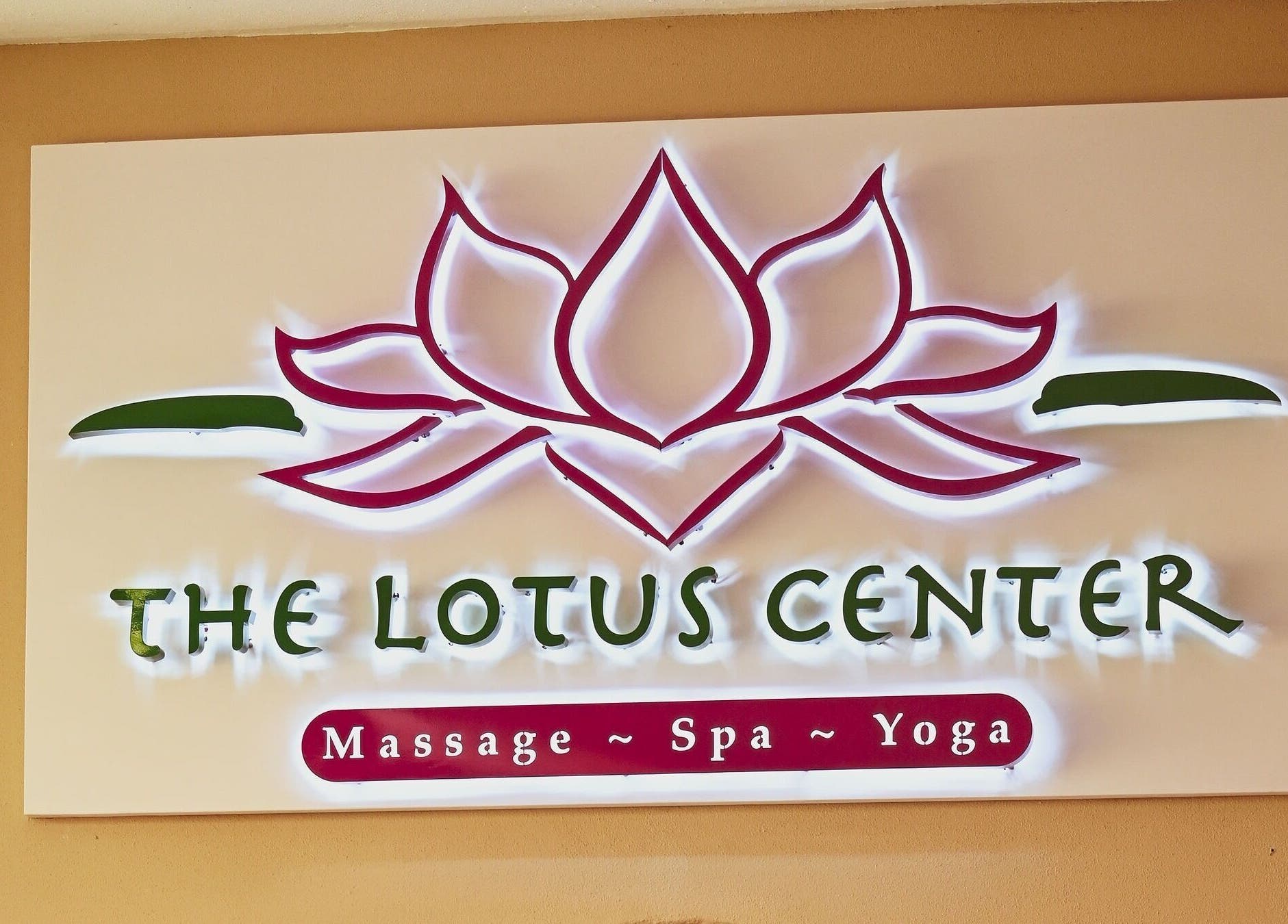 Illuminated sign of The Lotus Center Spa in Virgin Gorda, British Virgin Islands, US.