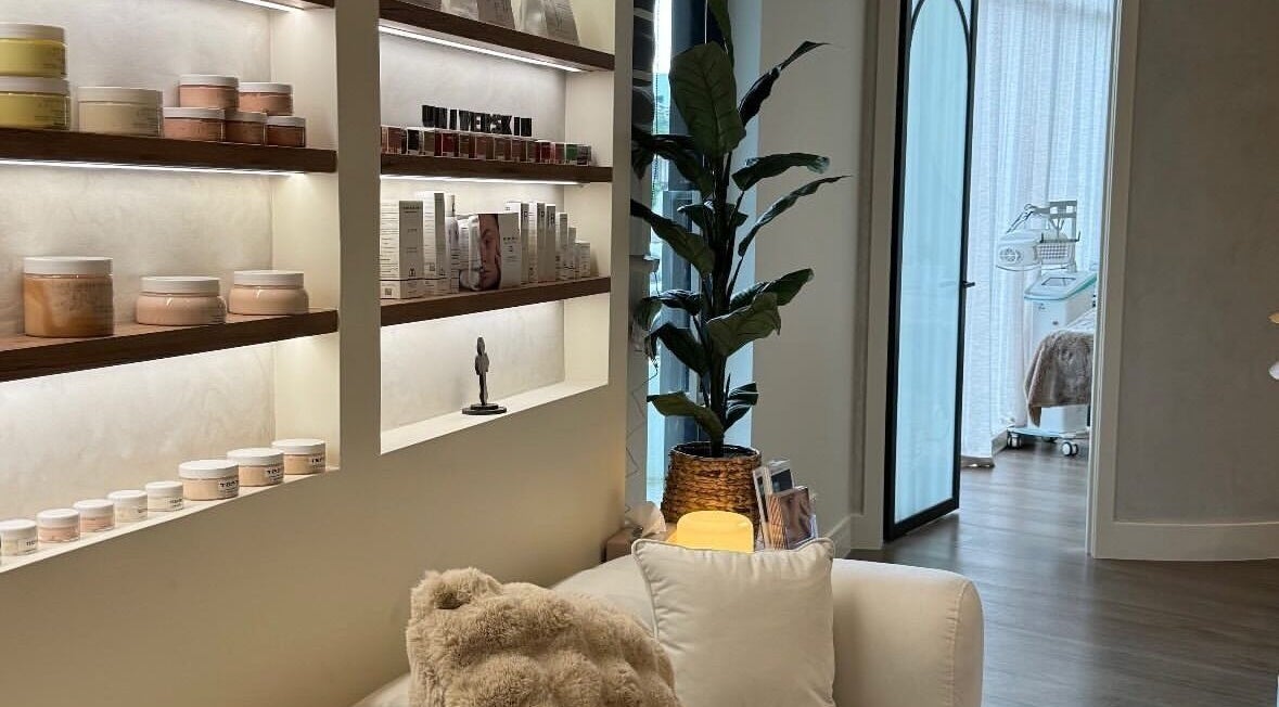 Saaha Aesthetics lounge in Melbourne, Victoria, AU with elegant shelves and cozy seating.