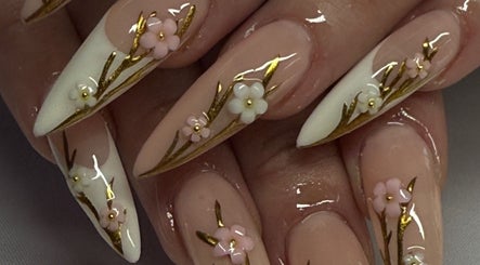 Elegant floral nail design at Gelz by Ellz, Napier, Hawke's Bay Region, NZ. Perfect for a stylish manicure.