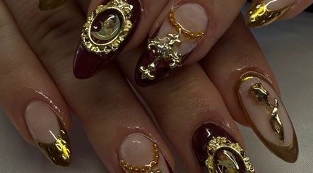 Elegant nail art with gold accents at Gelz by Ellz, Napier, Hawke's Bay Region, NZ.
