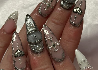 Intricate nail art design at gelz by ellz in Napier, Hawke's Bay Region, NZ, showcasing silver embellishments.