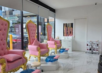 Elegant pink and gold pedicure chairs at Vr Nails in Melbourne, Victoria, AU, offering luxury nail services.