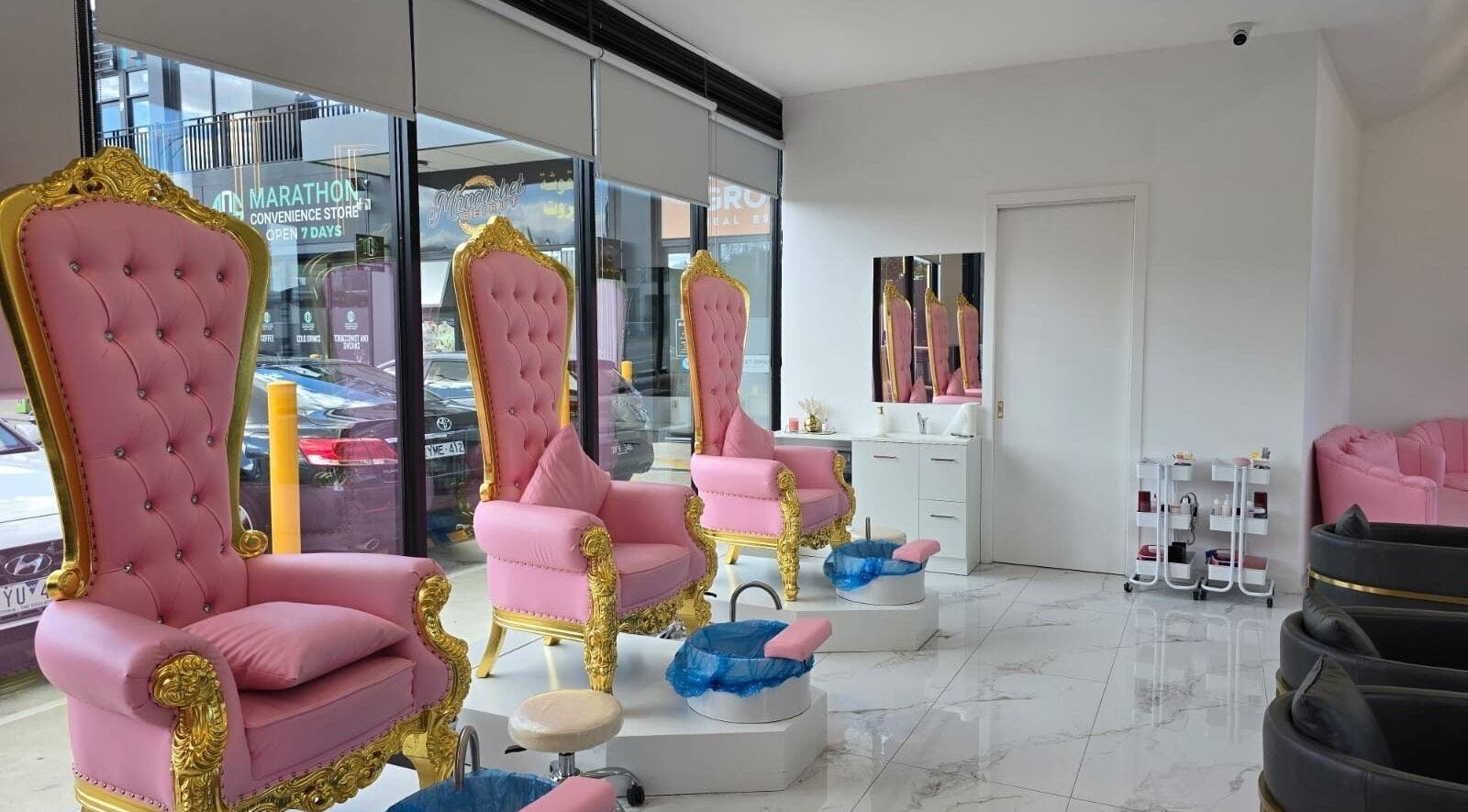 Elegant pink and gold pedicure chairs at Vr Nails in Melbourne, Victoria, AU, offering luxury nail services.