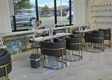 Elegant nail salon interior at Vr Nails in Melbourne, Victoria, AU with stylish seating and decor.