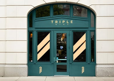 Elegant green entrance of Triple Nine Barber Gents Care Center in Abu Dhabi, Abu Dhabi, AE.