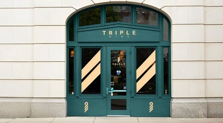 Elegant green entrance of Triple Nine Barber Gents Care Center in Abu Dhabi, Abu Dhabi, AE.