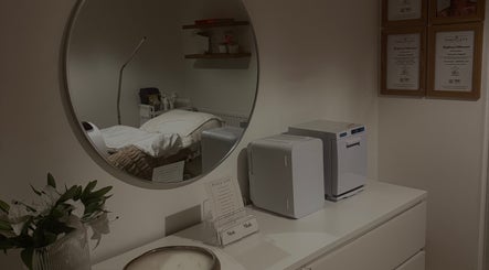 A serene treatment room at Mais Skin Studios, Maidstone, England, GB, with elegant decor and modern equipment.