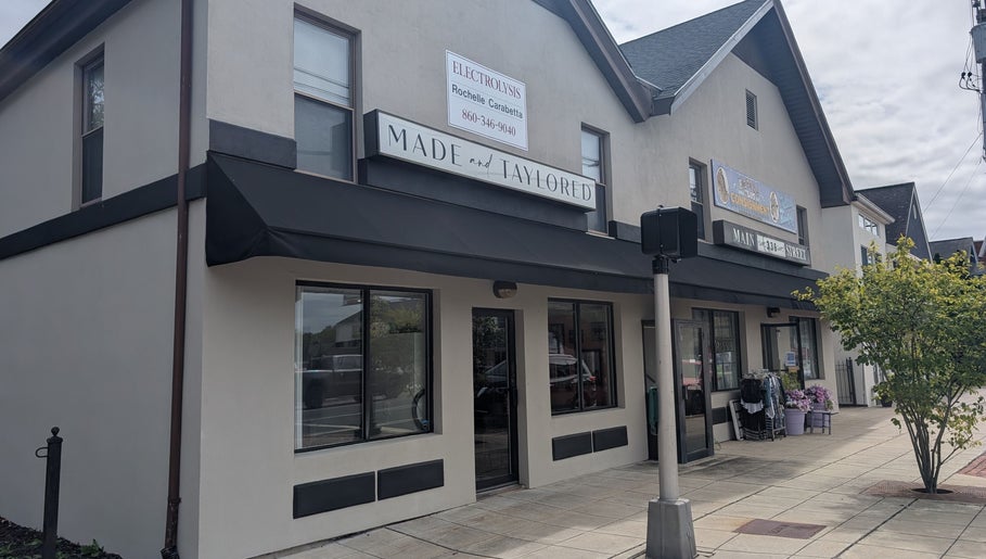 Exterior view of Crystal Pavis, LMT in Cromwell, Connecticut, US with a modern storefront.