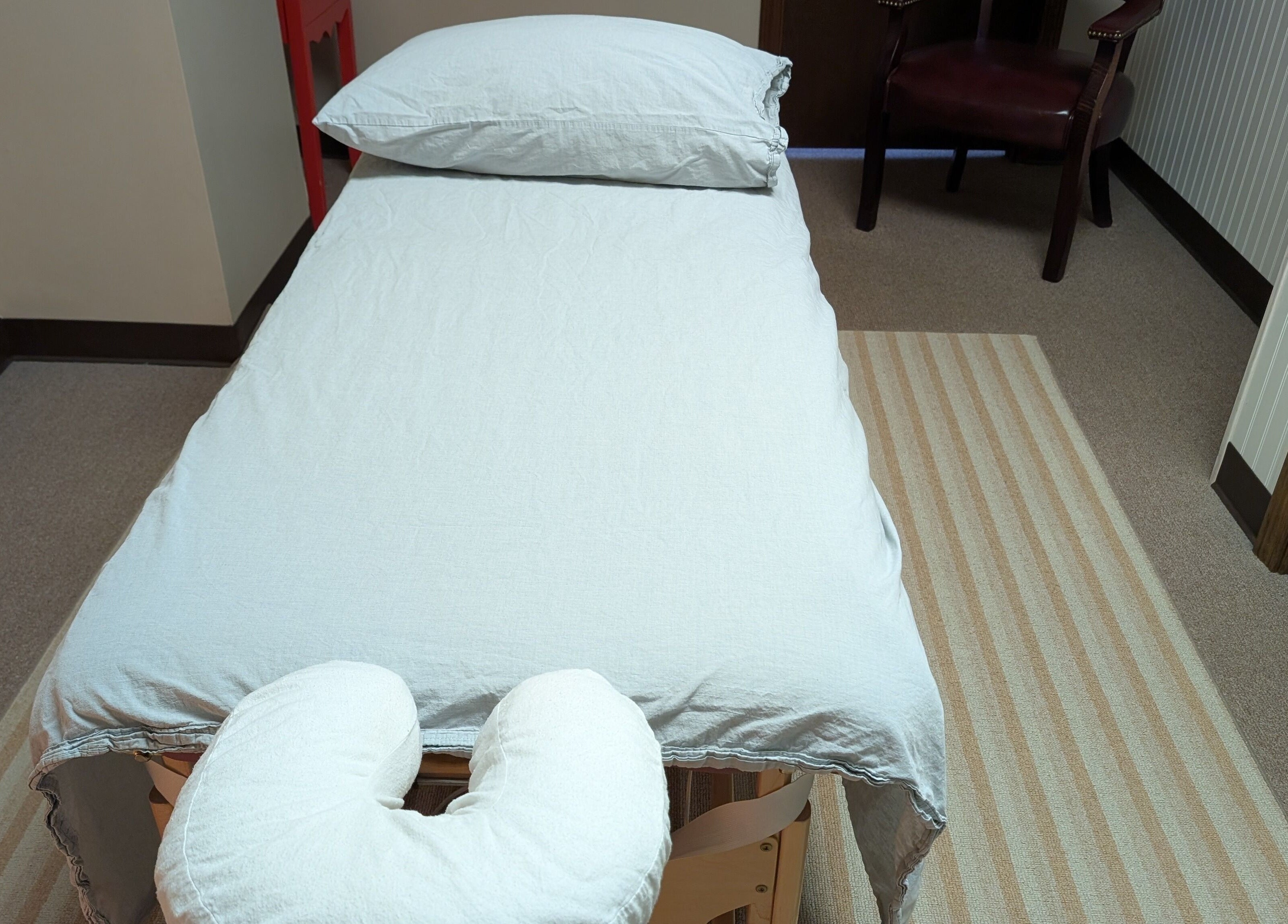 Massage table setup at Crystal Pavis, LMT in Cromwell, Connecticut, US ready for a relaxing treatment.