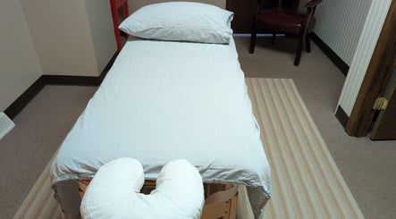 Massage table setup at Crystal Pavis, LMT in Cromwell, Connecticut, US ready for a relaxing treatment.