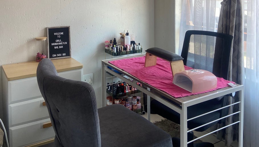 Nail station at GIRLS_WANAHAVEFUN By Irene, Alberton, Gauteng, ZA, with manicure tools on a pink towel.