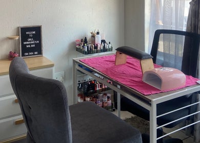 Nail station at GIRLS_WANAHAVEFUN By Irene, Alberton, Gauteng, ZA, with manicure tools on a pink towel.