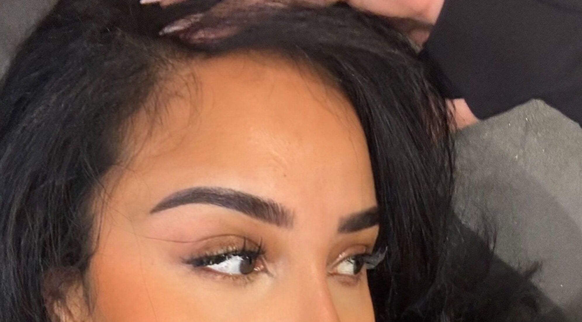 Expertly shaped eyebrows at Brows_byTam, London, England, GB showcasing precise beauty techniques.