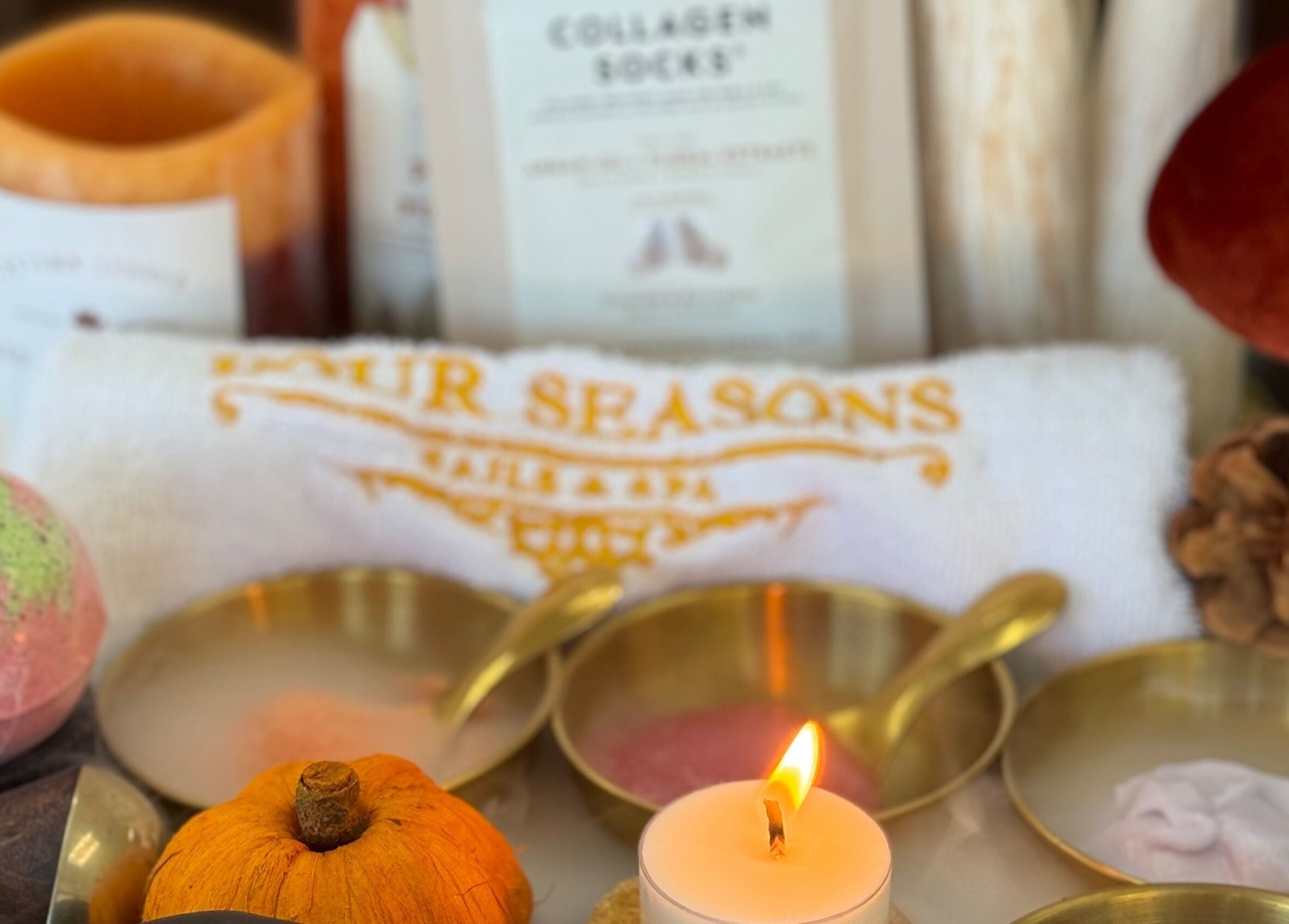 Relaxing spa setting at Four Seasons Nails and Spa Sherwood in Sherwood, Oregon, US with candles and bath bombs.